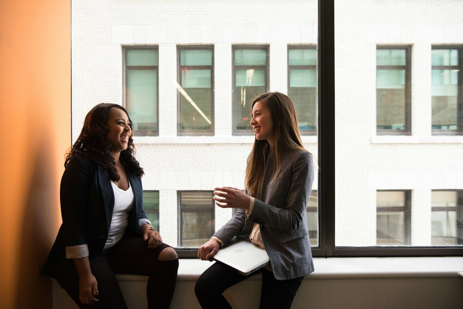 Two women speaking